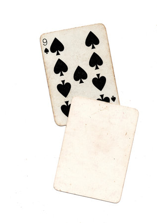 A vintage playing card with one blank card for text or copy on a white background.の写真素材