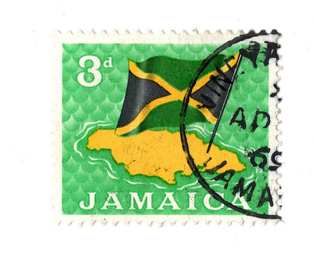 A stamp printed in Jamaica shows image of the Flag of Jamaica.の写真素材