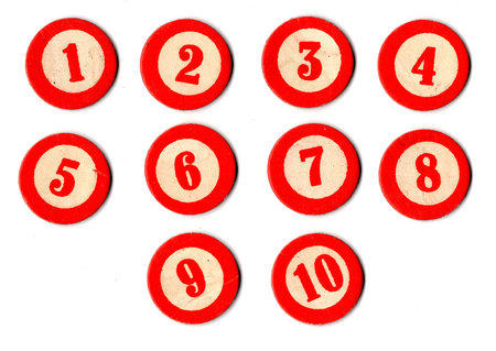 Vintage bingo or lotto cardboard counters isolated on a white background.の写真素材