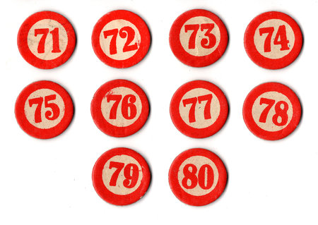 Vintage bingo or lotto cardboard counters isolated on a white background.