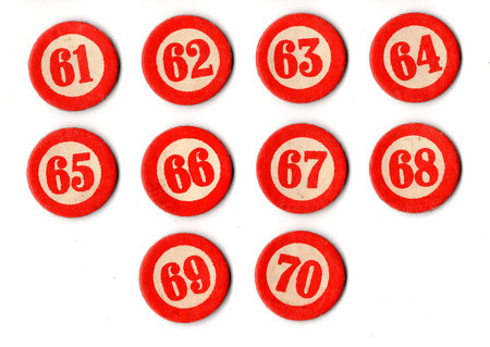 Vintage bingo or lotto cardboard counters isolated on a white background.