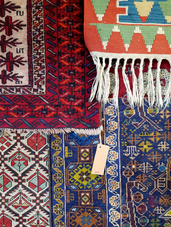Colourful Turkish carpets for sale.