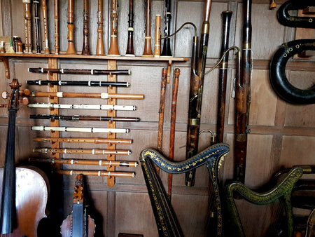 A display of antique wind instruments.