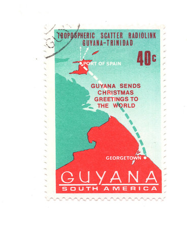 A vintage postage stamp from Guyana isolated on a white background.