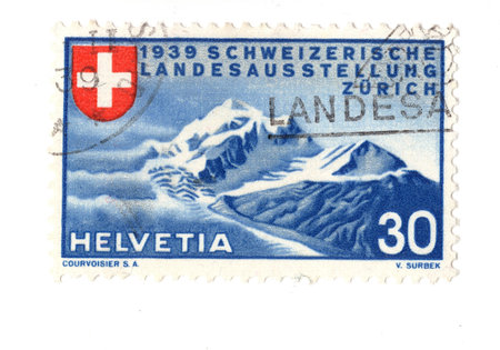 A vintage postage stamp from Switzerland isolated on a white background.の写真素材