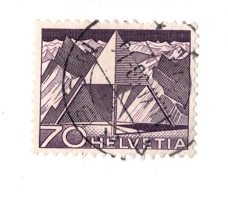 A vintage postage stamp from Switzerland isolated on a white background.の写真素材