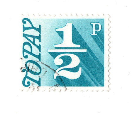 A vintage TO PAY postage stamp from Great Britain isolated on a white background.の写真素材