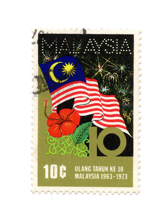 A stamp printed in Malaysia shows image of the National Flag.の写真素材