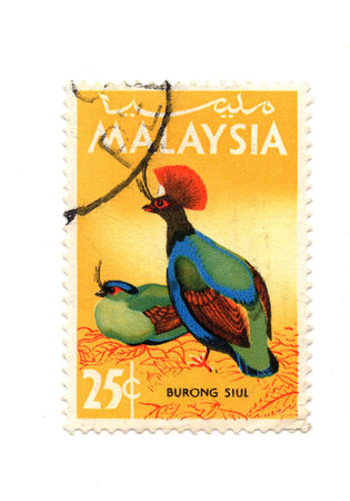 A vintage postage stamp from Malaysia isolated on a white background.の写真素材