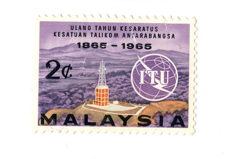 A vintage postage stamp from Malaysia isolated on a white background.の写真素材