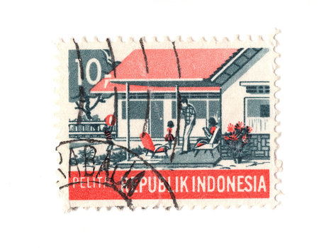 A vintage postage stamp from Indonesia isolated on a white background.の写真素材