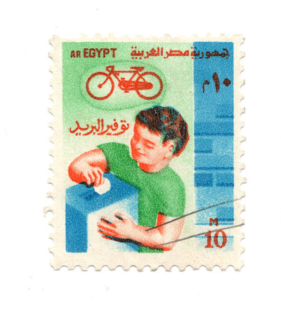 A stamp printed in Egypt shows image of a cyclist.の写真素材