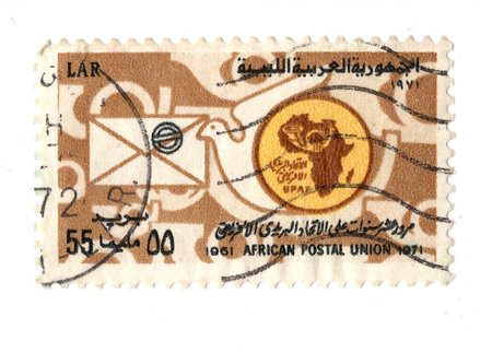 A vintage postage stamp isolated on a white background.の写真素材