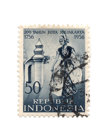 A vintage postage stamp from Indonesia isolated on a white background.の写真素材