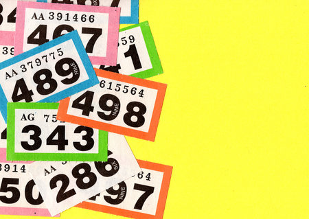 Raffle tickets on a brightly coloured background.
