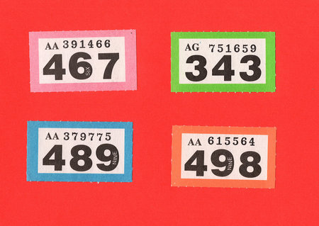 Raffle tickets on a brightly coloured background.