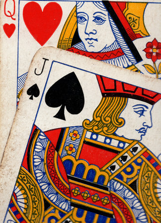 Close up detail of a pair of vintage pontoon or blackjack playing cards.