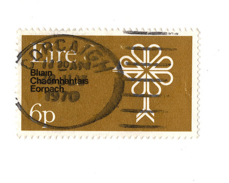 A vintage postage stamp from Ireland isolated on a white background.