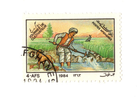 A vintage postage stamp from Afghanistan isolated on a white background.の写真素材