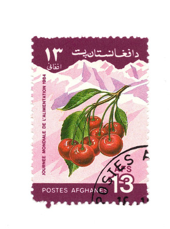 A vintage postage stamp from Afghanistan isolated on a white background.