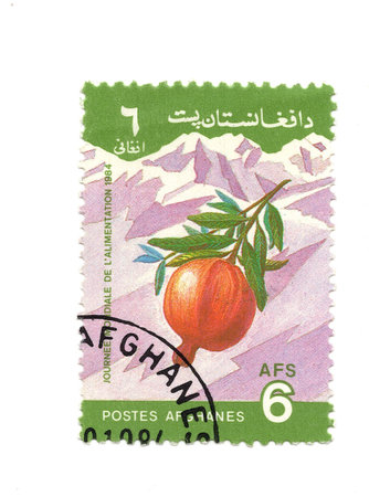 A vintage postage stamp from Afghanistan isolated on a white background.の写真素材