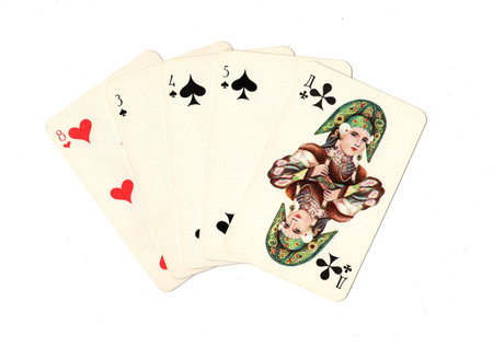 A hand of vintage Russian playing cards isolated on a white background.