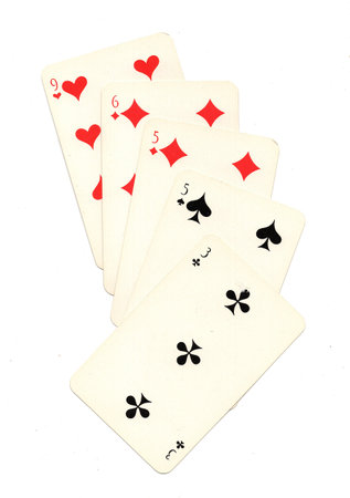 A hand of vintage Russian playing cards isolated on a white background.
