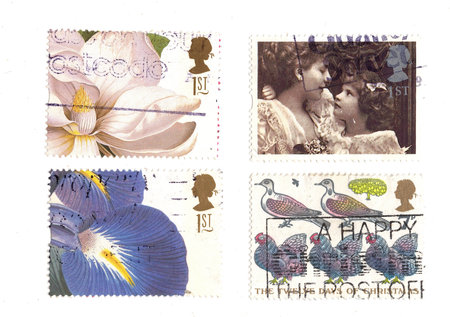 Vintage postage stamps from Great Britain isolated on a white background.の写真素材