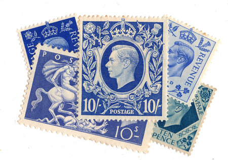 Vintage King George VI postage stamps from Great Britain isolated on a white background.の写真素材