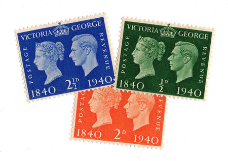 Vintage King George VI postage stamps from Great Britain isolated on a white background.の写真素材