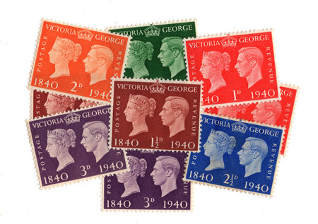 Vintage King George VI postage stamps from Great Britain isolated on a white background.の写真素材