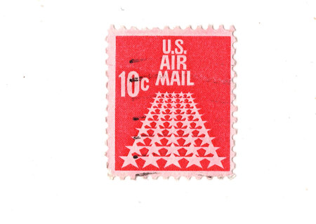 A vintage Christmas postage stamp isolated on a white background.の写真素材