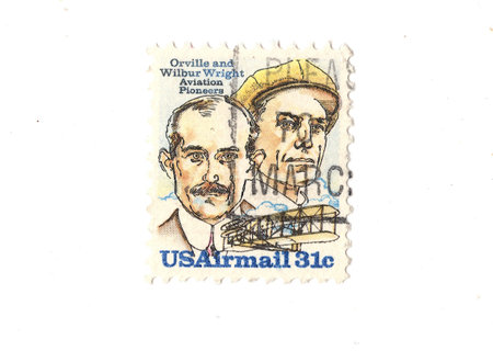 A vintage Air Mail postage stamp from the USA isolated on a white background.
