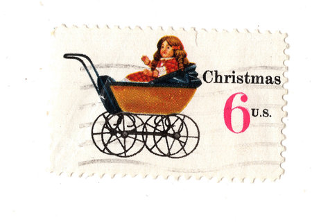 A vintage Christmas postage stamp from the USA isolated on a white background.の写真素材