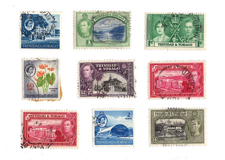 Vintage postage stamps from Trinidad and Tobago isolated on a white background.