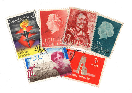 Vintage postage stamps from the Netherlands isolated on a white background.
