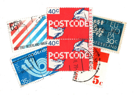 Vintage postage stamps from the Netherlands isolated on a white background.