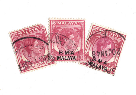 Vintage postage stamps from Malaya isolated on a white background.の写真素材