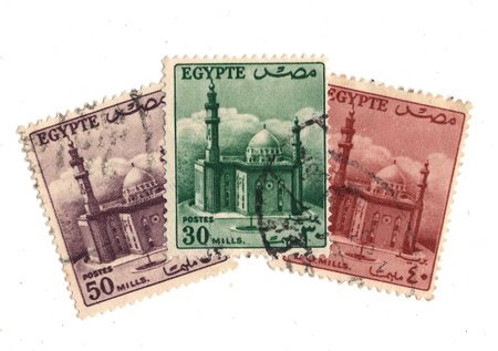 Vintage postage stamps from Egypt showing  mosque isolated on a white background.