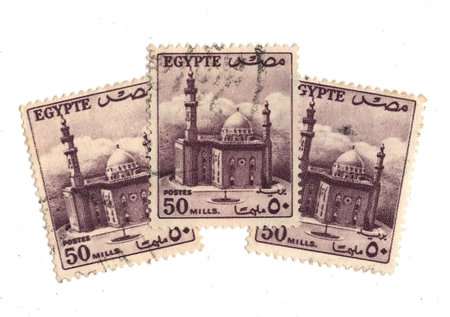 Vintage postage stamps from Egypt showing  mosque isolated on a white background.