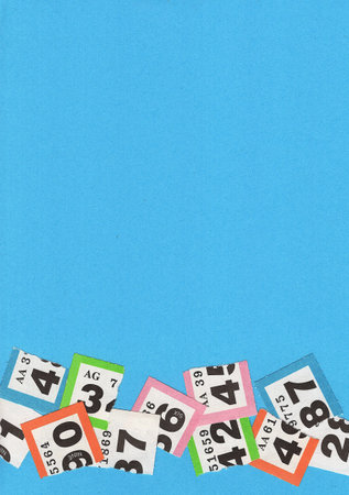 Torn vintage raffle tickets on a bright blue background.の写真素材