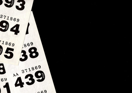 Vintage raffle/lottery tickets isolated on a black background.