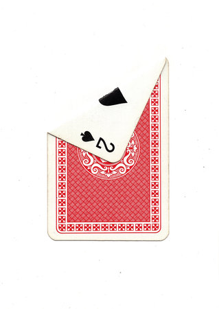 A vintage playing card on a white background with one corner revealed.