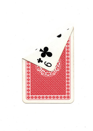 A vintage playing card on a white background with one corner revealed.