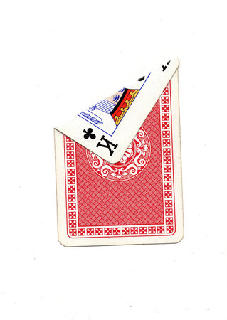 A vintage playing card on a white background with one corner revealed.