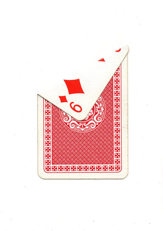 A vintage playing card on a white background with one corner revealed.