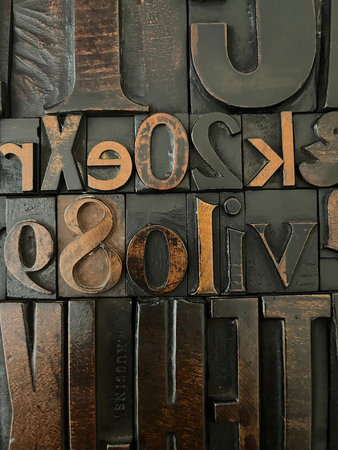 Vintage letterpress wood type printing blocks close-up macro shot