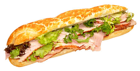 A roast ham baguette sandwich with lettuce, isolated on a white background の写真素材