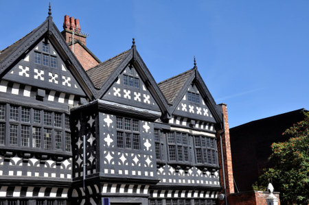Traditional Tudor period timber framed black and white manor house in Stockport, England のeditorial素材