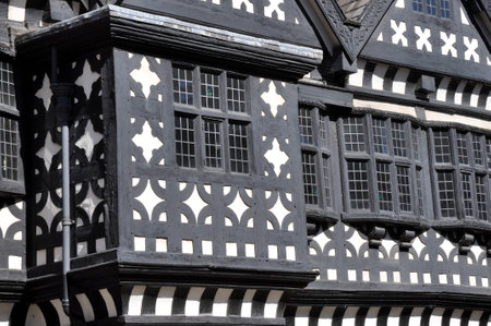 Traditional Tudor period timber framed black and white manor house in Stockport, England のeditorial素材